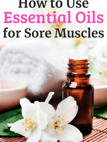 A jar of essential oils next to flowers with a text overlay about essential oils for sore muscles