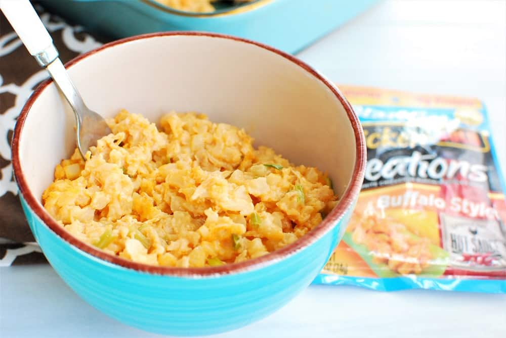 Bowl of buffalo chicken cauliflower casserole next to a StarKist pouch