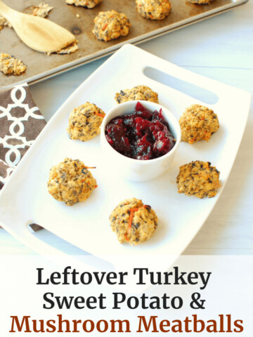 healthy leftover turkey mushroom meatballs with sweet potato and carrots on a white plate with cranberry sauce