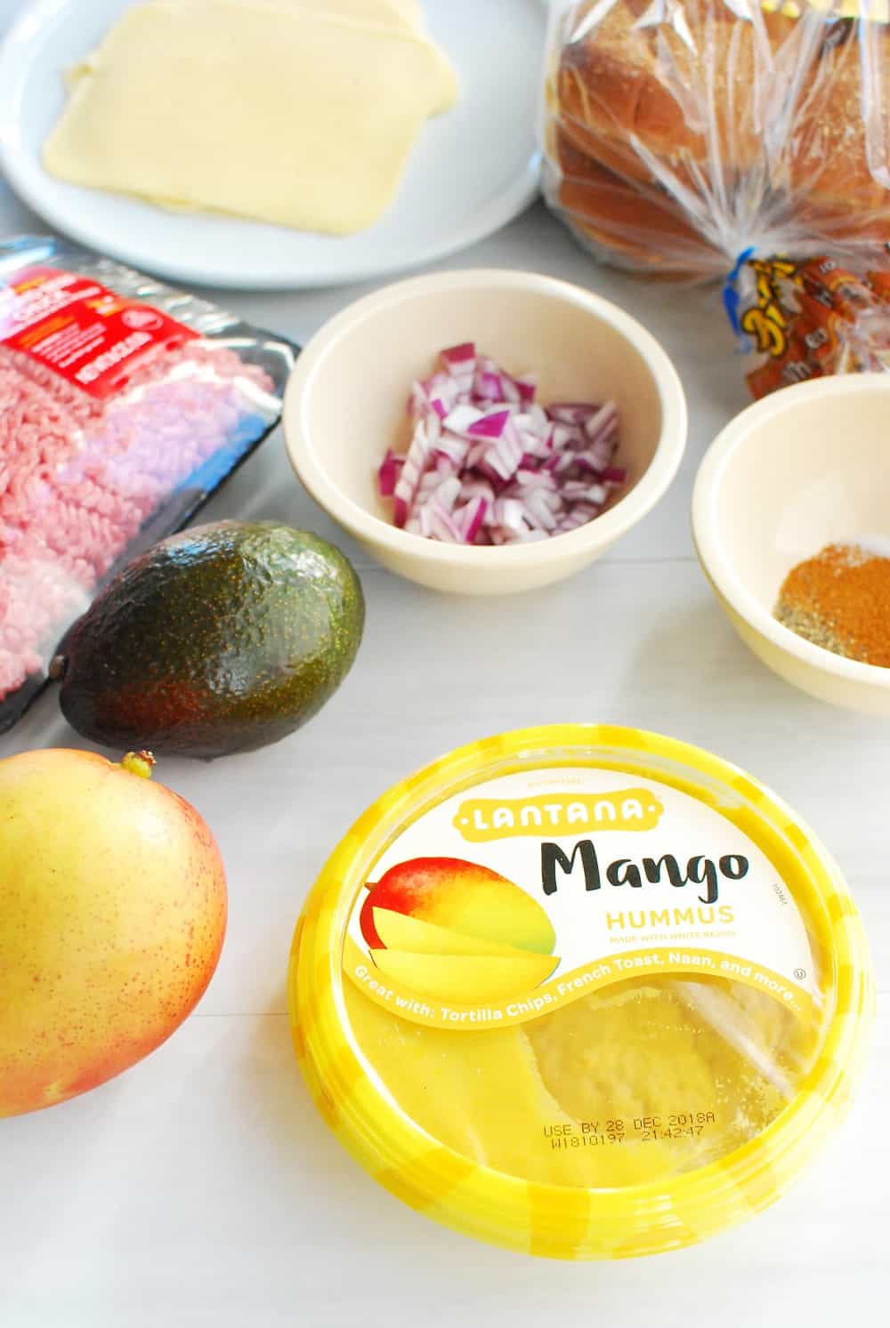 Ingredients to make avocado mango burgers