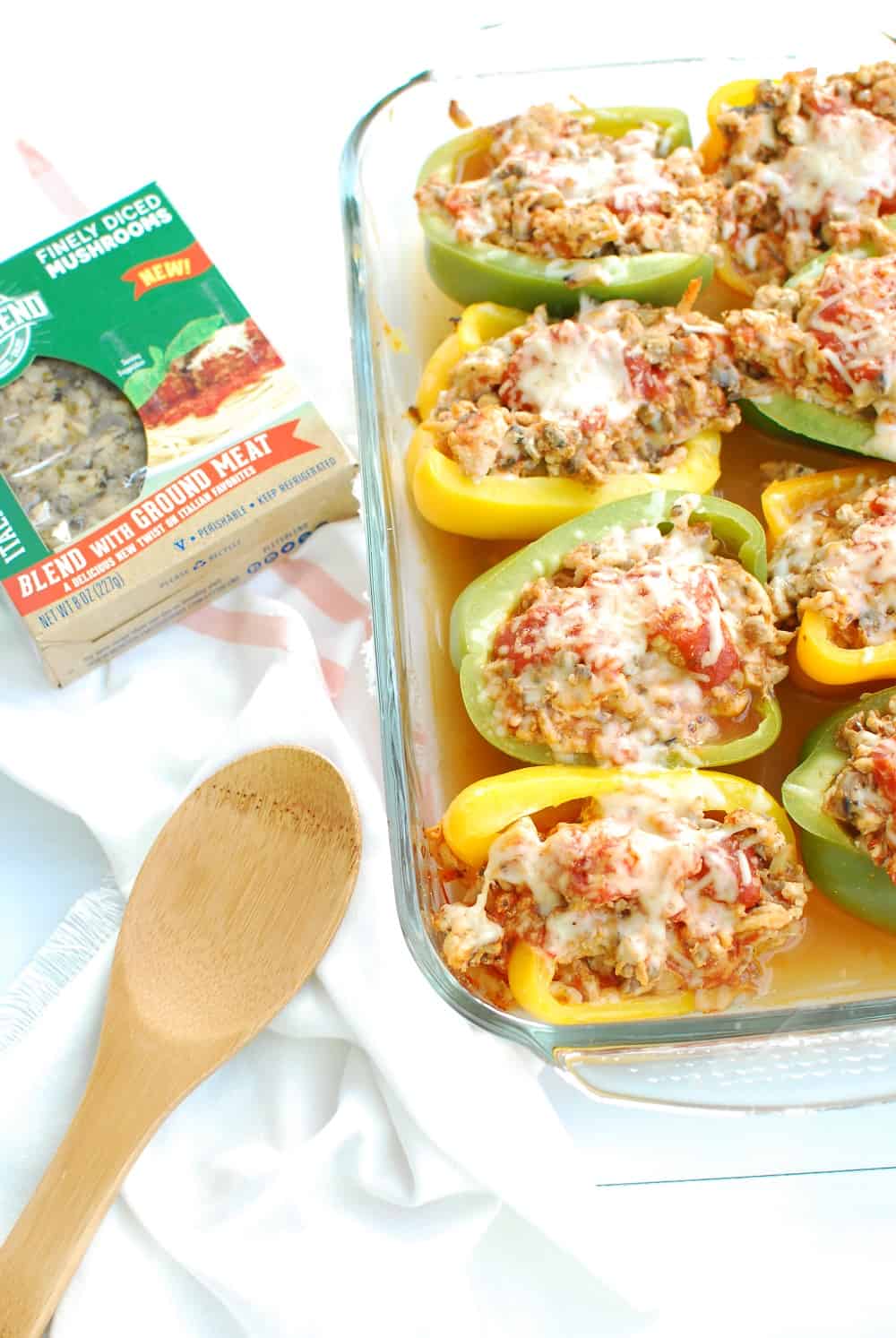 A casserole dish of chicken parm stuffed peppers