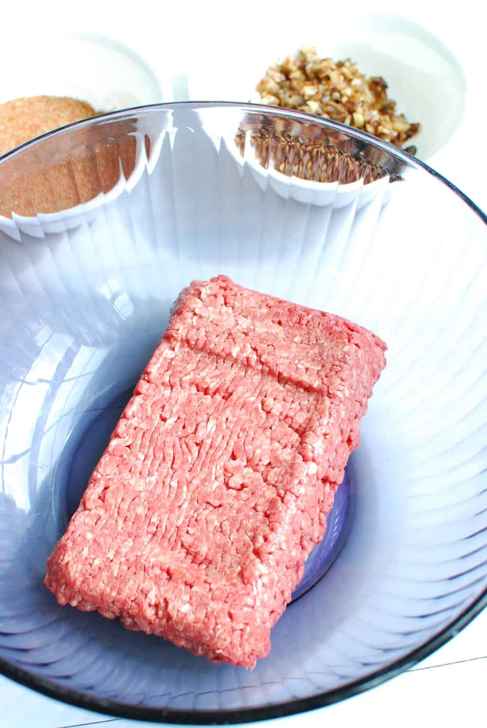 Ingredients to make a black and blue burger