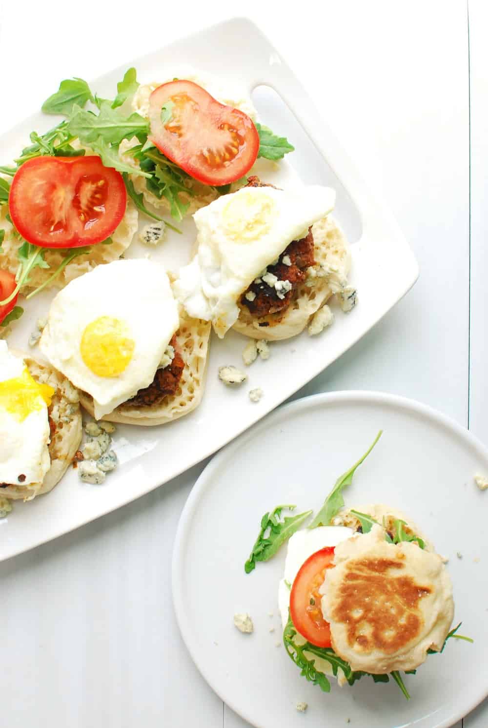 A platter full of breakfast black and blue burgers