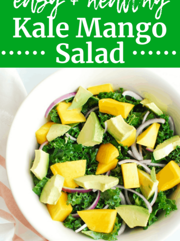 A bowl full of kale mango salad next to a napkin