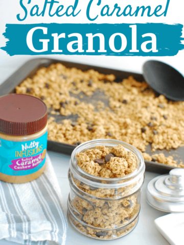 A small jar full of homemade salted caramel vegan granola, next to a pan of more granola
