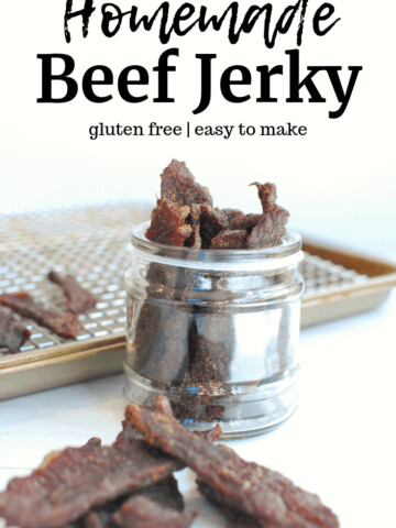 Several strips of gluten free beef jerky in a small jar