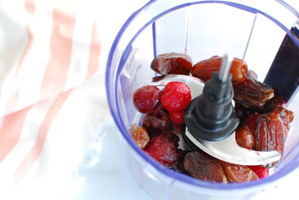 Cherries and dates in a food processor