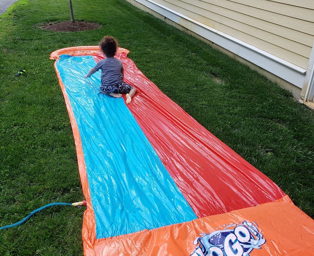 A child on a slip and slide