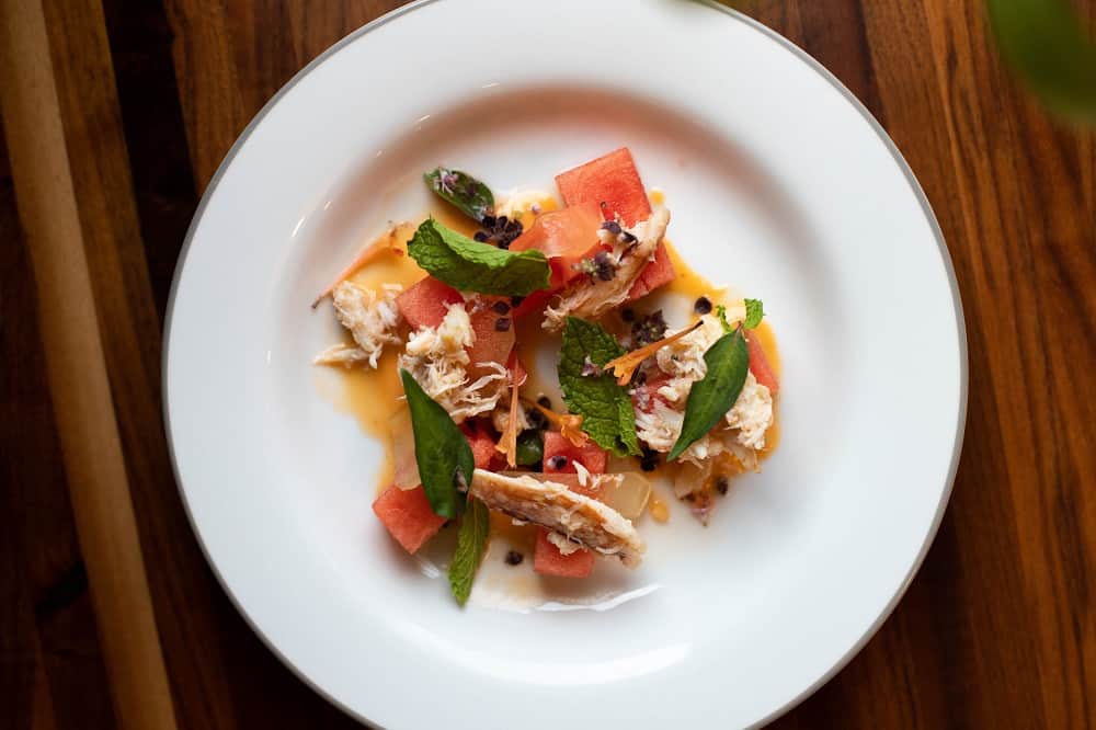 A plate of watermelon crab salad