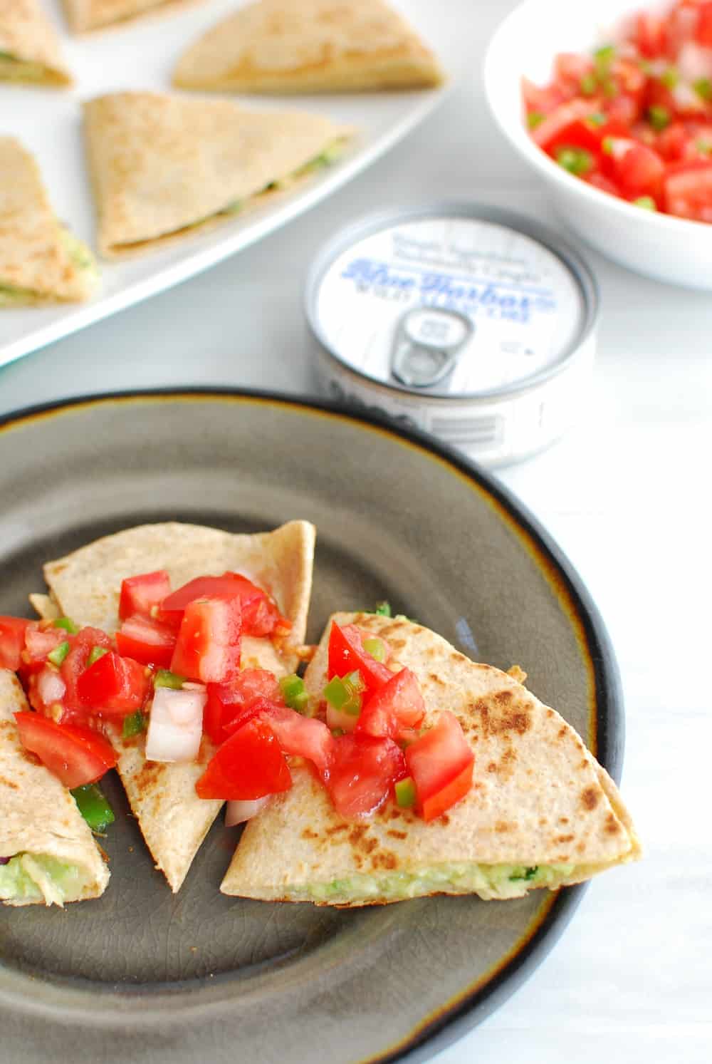 Tuna quesadillas topped with pico de gallo