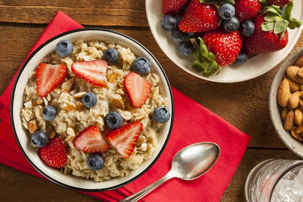 A bowl of oatmeal with berries