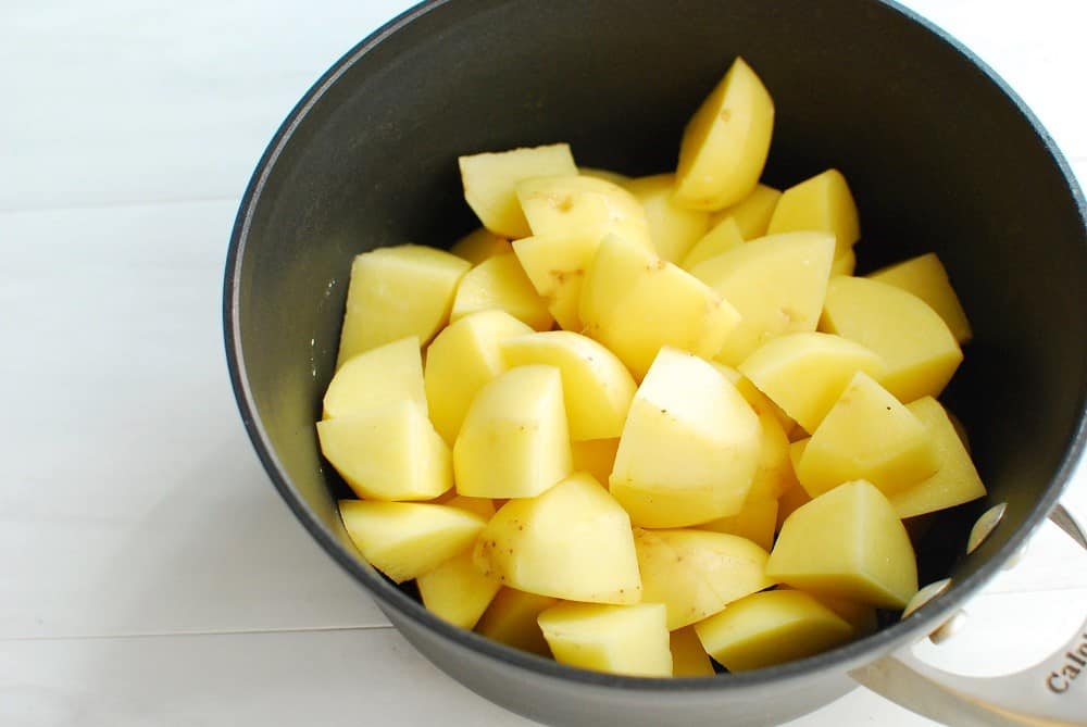 Chopped potatoes in a pot