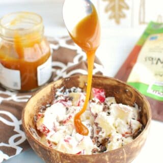 healthy caramel apple salad being drizzled with caramel