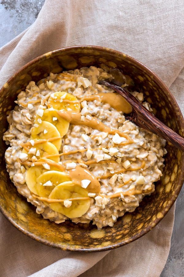 vegan banana peanut butter healthy overnight oats in a bowl