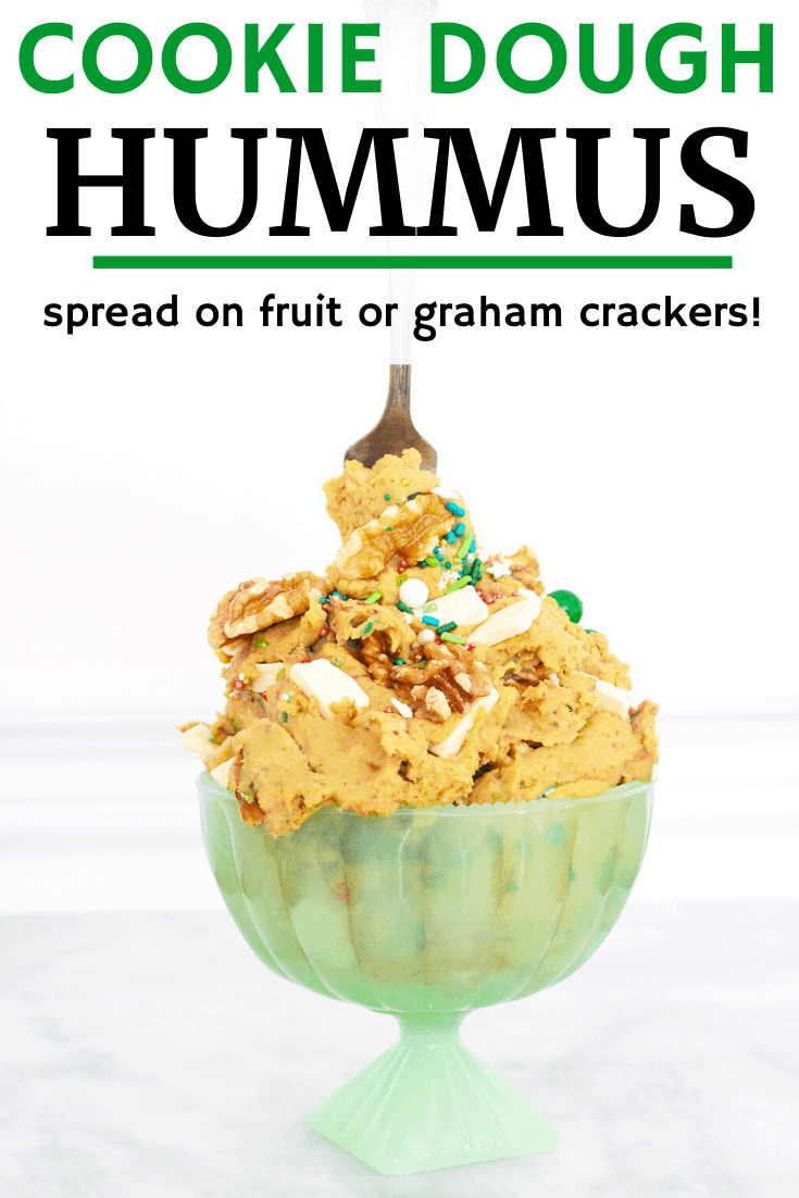 A green bowl full of cookie dough hummus.
