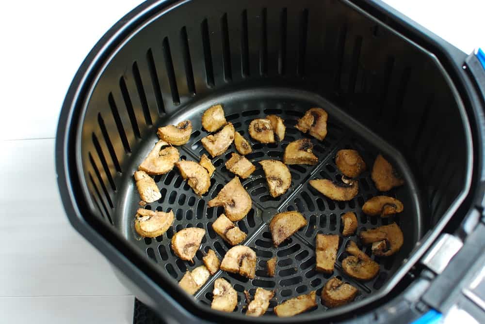sliced mushrooms cooked in an air fryer