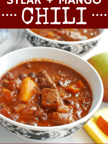 a bowl of mango chili with steak next to a whole mango