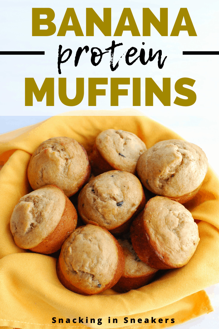 A bowl with a yellow napkin filled with banana protein muffins.