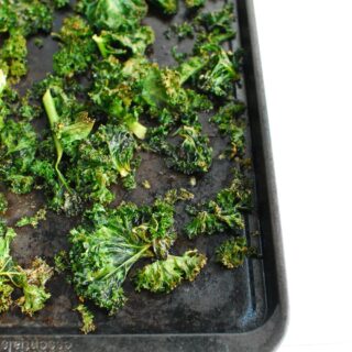 a baking sheet full of cooked ranch kale chips