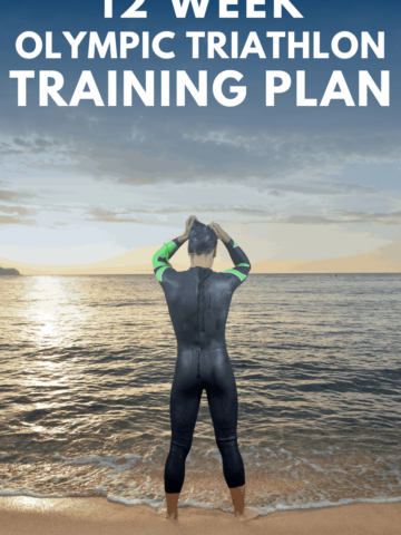 a woman standing outside by the water getting ready to train for a triathlon swim