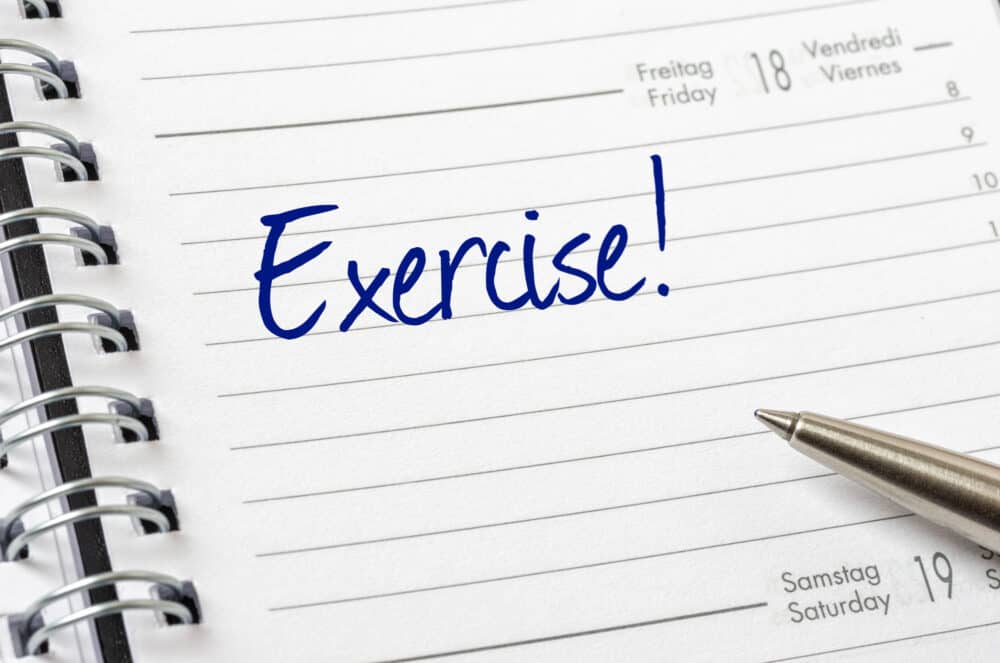 a planner with exercise scheduled into that day's tasks