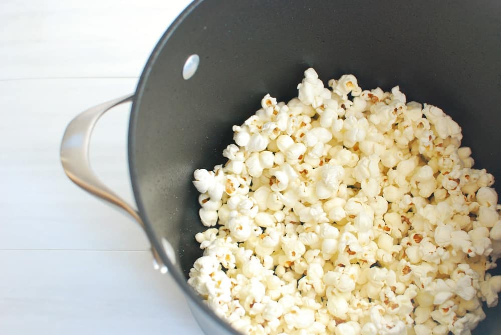 a pot full of popped popcorn