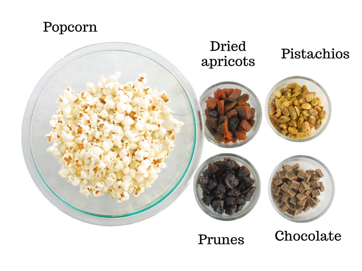 Popcorn, apricots, prunes, pistachios, and chocolate.