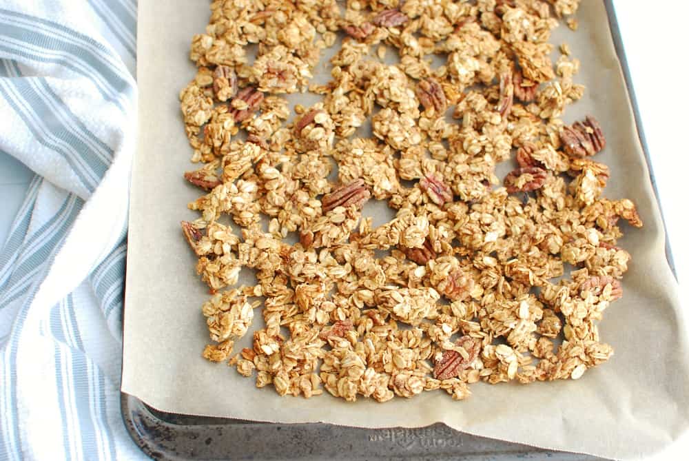 A baking sheet with just baked banana granola.