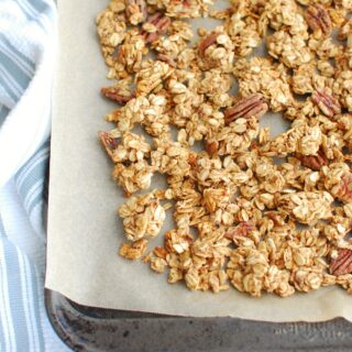 a baking sheet full of peanut butter banana granola