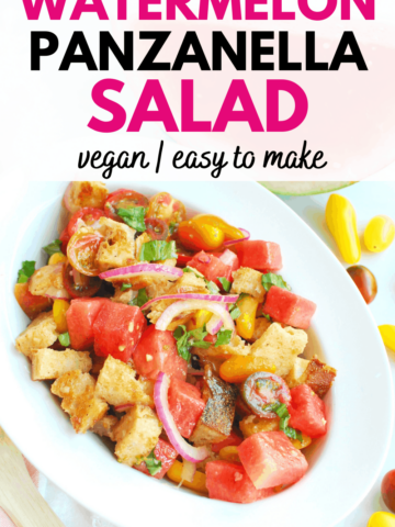 a white oblong bowl full of watermelon panzanella salad