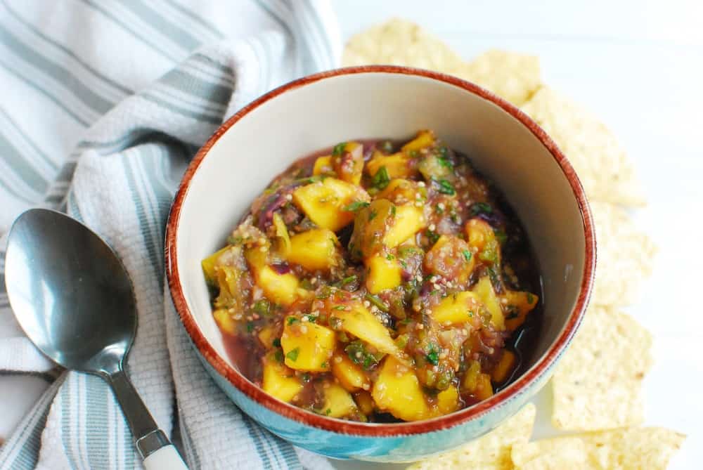 Mango Tomatillo Salsa Snacking in Sneakers