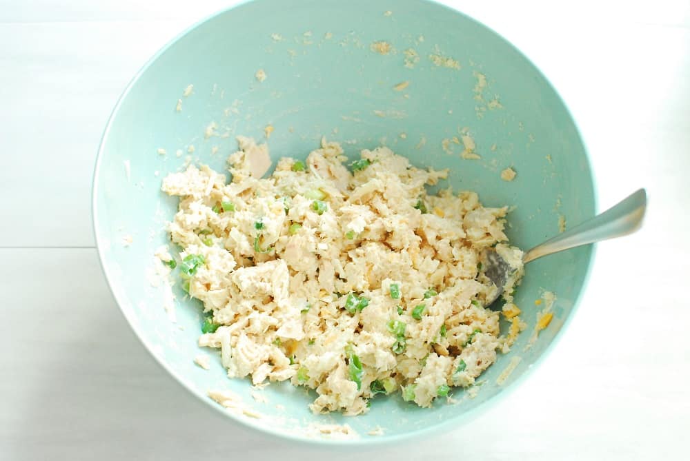 a bowl of cheesy salmon filling that will be put into mushrooms