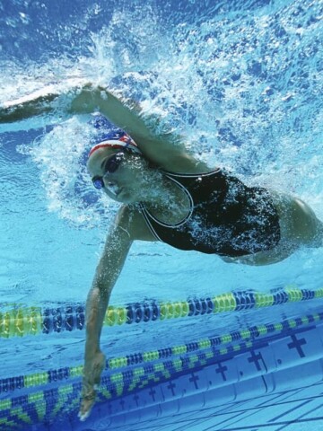 a female athlete swimming in a pool