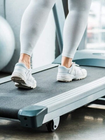 a woman's legs on the treadmill.