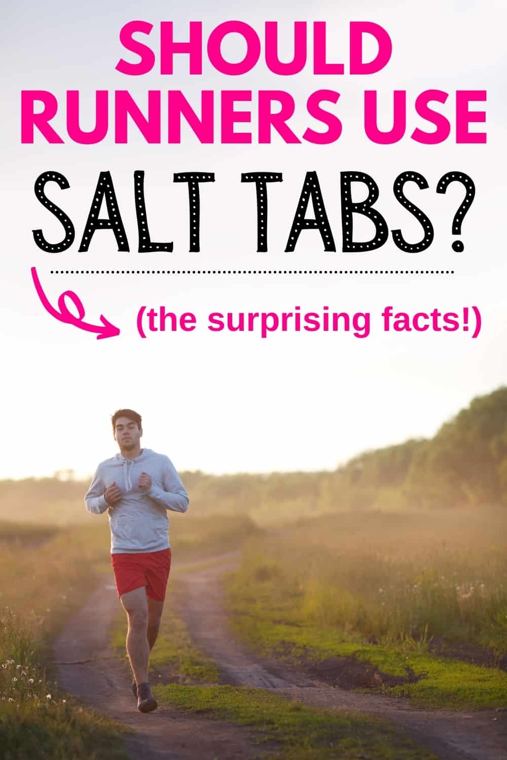 a man running outside on a sunny day through a grass path with a text overlay that says should runners use salt tabs