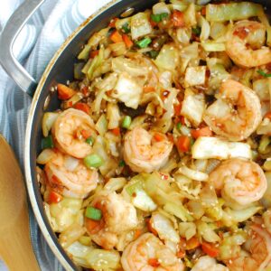 Close up of a pan full of shrimp egg roll in a bowl.