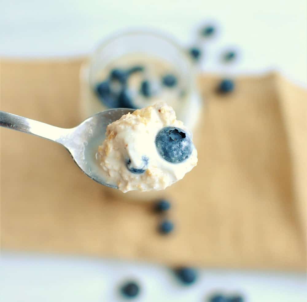 A spoonful of blueberry overnight oats.