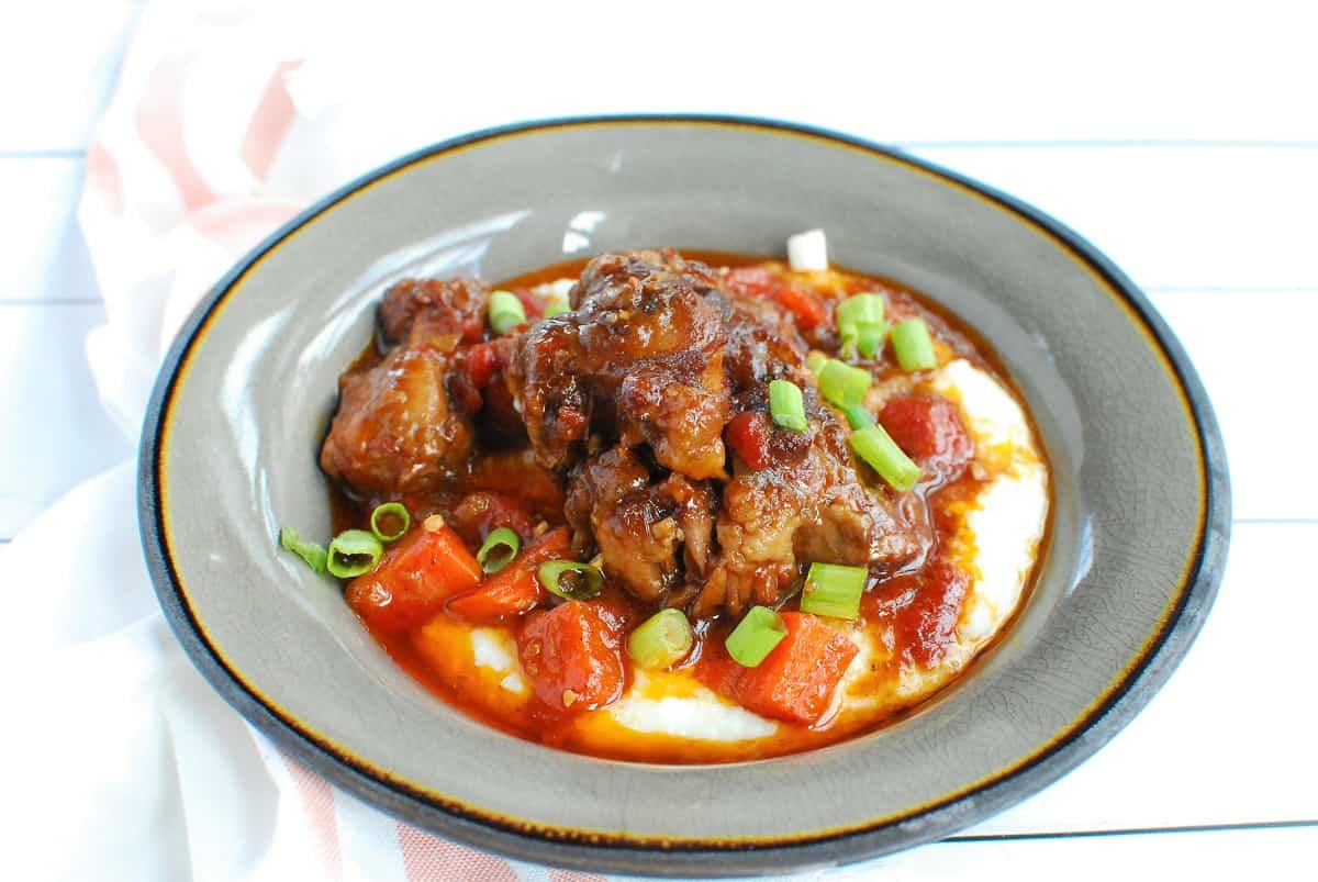 Slow Braised Oxtail and Grits Snacking in Sneakers