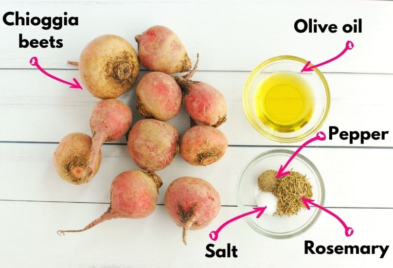 Overhead shot of ingredients: beets, olive oil, rosemary, salt, and pepper.