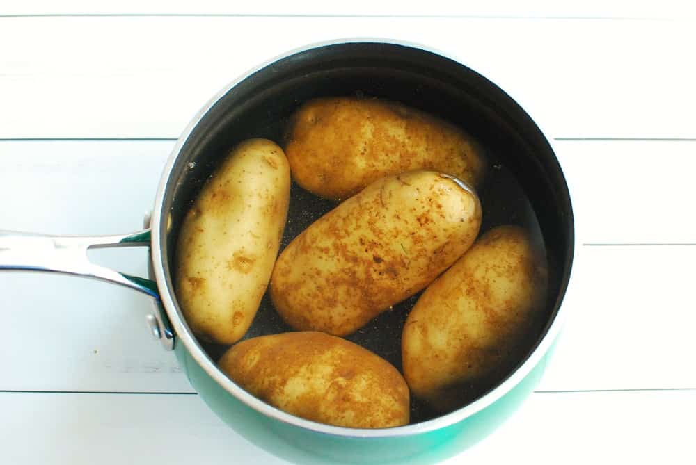 Potatoes in a pot with water.