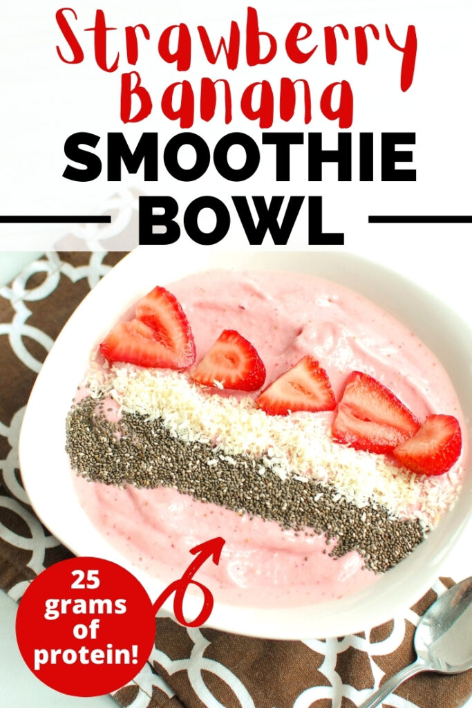 A strawberry banana smoothie bowl topped with chia seeds, coconut, and strawberries.