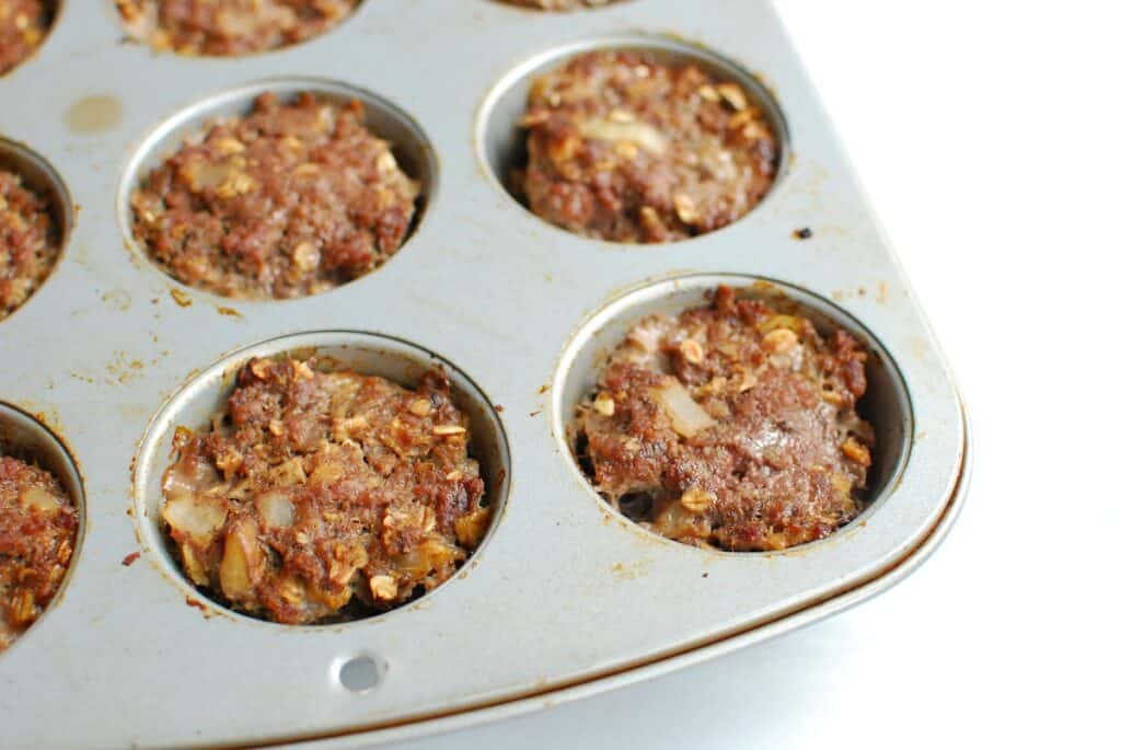 Mini meatloaves cooked in a muffin tin.