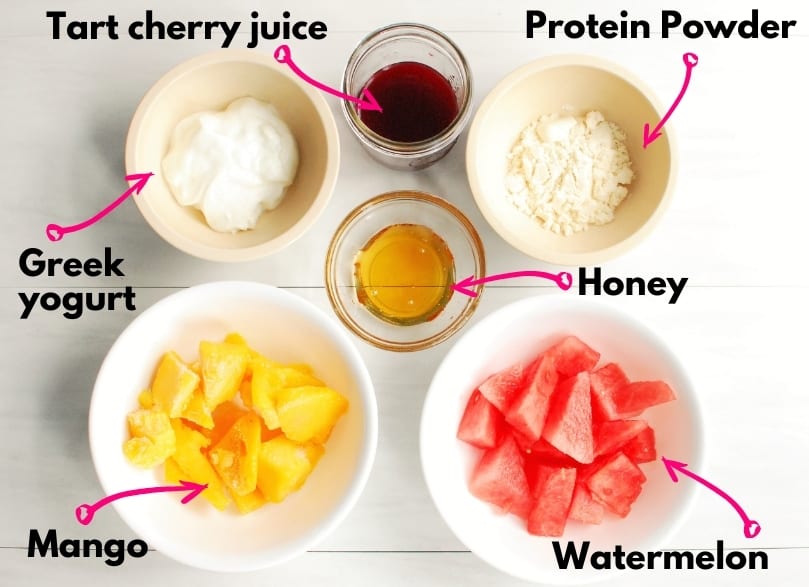 All the ingredients - watermelon, mango, honey, protein powder, tart cherry juice, and greek yogurt.