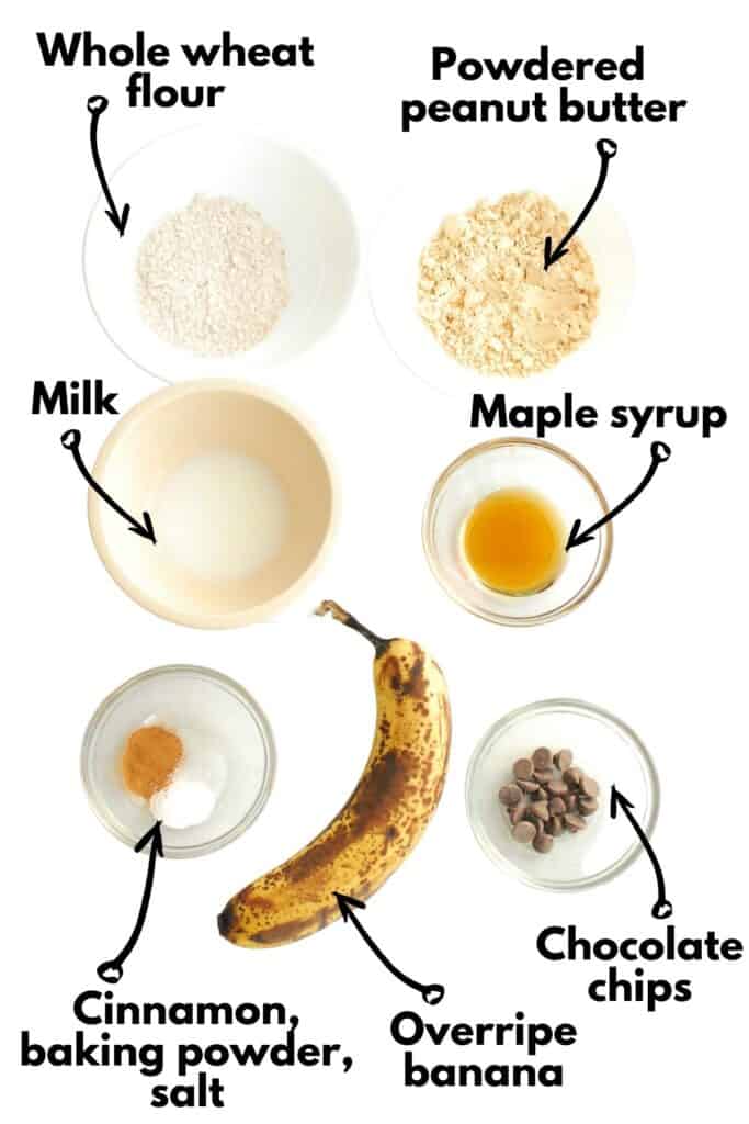 Flour, powdered peanut butter, milk, maple syrup, baking powder, cinnamon, salt, banana, and chocolate chips.