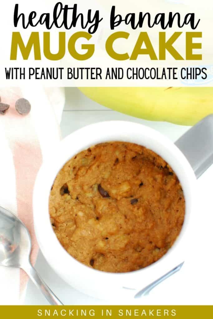 An overhead shot of healthy banana mug cake, next to a napkin and some fresh bananas.