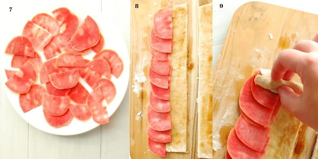 A plate with sliced apples, a cutting board with dough being layered with apples, and a hand starting to roll up the dough into the apple rose.