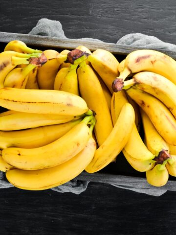 A bin full of bananas.