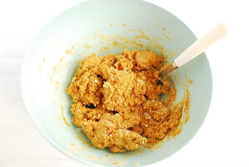 Peanut butter cookie dough in a mixing bowl.