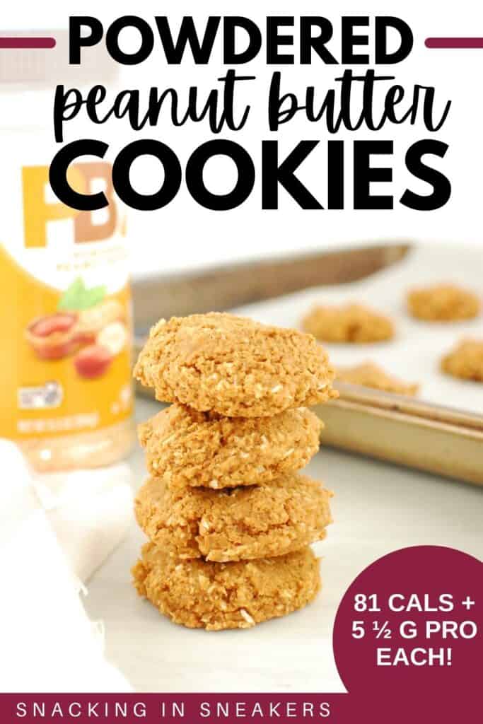 A stack of powdered peanut butter cookies with a bottle of peanut butter powder in the background.