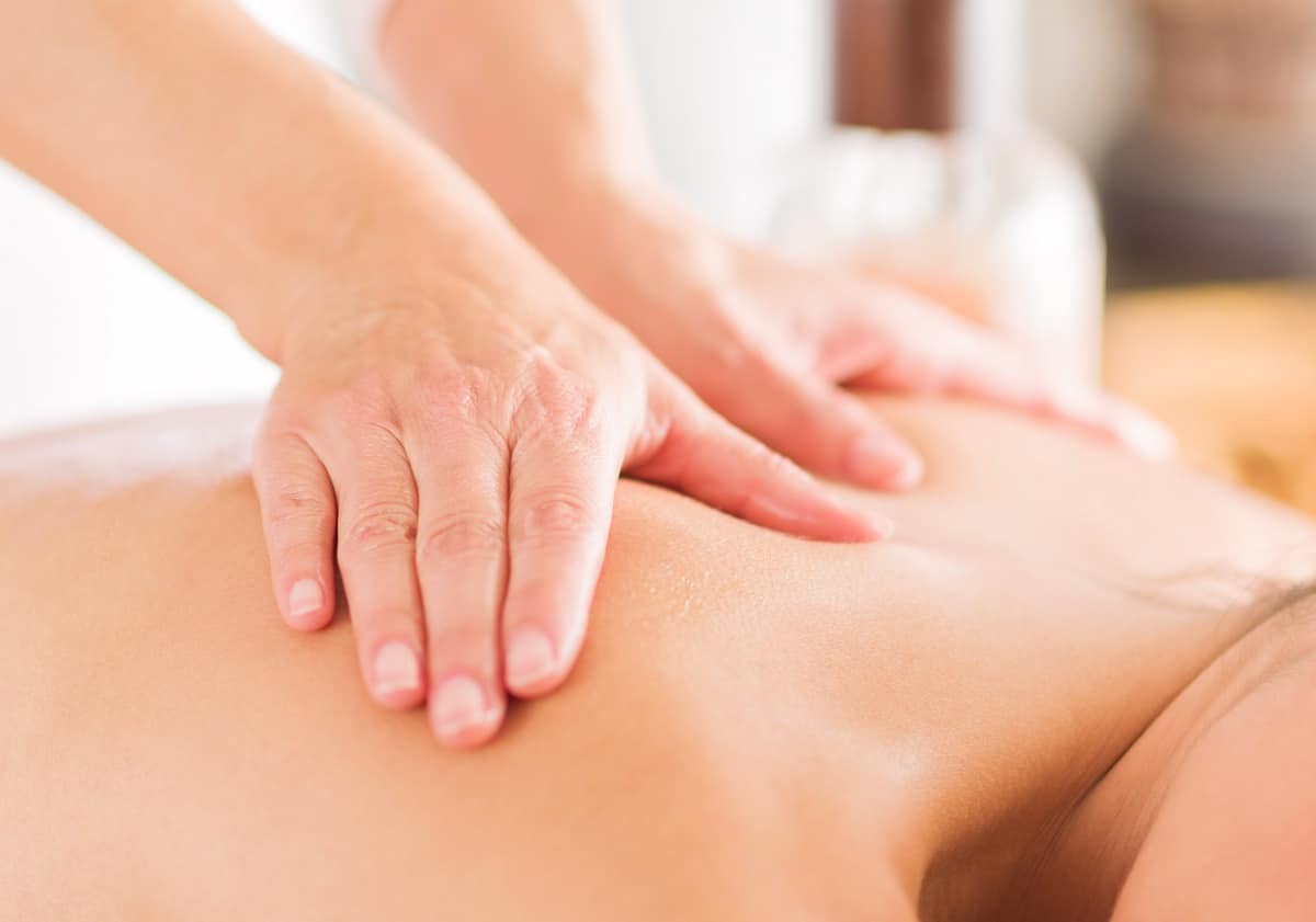 A professional massage therapist giving a massage.